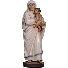 Life size catholicism mother Teresa holding baby sculpture